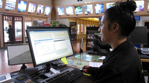 Rotorua i-SITE supervisor Tysha Ranclaud using Ibis Technology Agent Reservations Software.